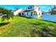 This home features a spacious yard and meticulous landscaping that enhances curb appeal at 1608 20Th W Ave, Palmetto, FL 34221