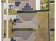 Aerial view highlighting roof condition, solar panels, yard sizes, and the layout of neighboring properties at 16632 Sunburst Lake St, Wimauma, FL 33598