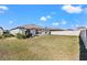 A spacious backyard providing an outdoor living area, showcasing the property's potential for outdoor enjoyment at 16632 Sunburst Lake St, Wimauma, FL 33598