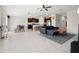 Spacious open floor plan with tile flooring and a large kitchen with a breakfast bar at 16632 Sunburst Lake St, Wimauma, FL 33598