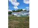 Sprawling backyard features a large pool, perfect for outdoor entertaining at 17430 Spring Valley Rd, Dade City, FL 33523