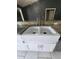 Farmhouse kitchen sink with granite countertops and updated fixtures at 17430 Spring Valley Rd, Dade City, FL 33523