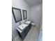 Bathroom showcasing double sinks and vanities at 1762 Fulton Ave, Clearwater, FL 33755