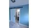 Bathroom showcasing a barn door and sink at 1762 Fulton Ave, Clearwater, FL 33755