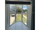 A bay window provides natural light and views to the front yard at 1762 Fulton Ave, Clearwater, FL 33755