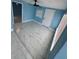 Bedroom with stylish tile floors, ceiling fan, and ample light from a large window at 1762 Fulton Ave, Clearwater, FL 33755