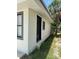 Exterior view of the home showcasing its sleek design and tidy landscaping at 1762 Fulton Ave, Clearwater, FL 33755