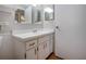 Bathroom featuring white vanity and hardware, one sink, and a mirror at 1828 Foxhunt Dr # A, Sun City Center, FL 33573