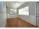 Dining area featuring wood floors, natural light, and a ceiling fan at 1828 Foxhunt Dr # A, Sun City Center, FL 33573