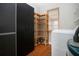 Practical laundry room boasts storage and ample space for appliances at 1828 Foxhunt Dr # A, Sun City Center, FL 33573