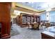Inviting library with shelves full of books, chairs, and tables on a cozy carpet, perfect for quiet reading and study at 1828 Foxhunt Dr # A, Sun City Center, FL 33573