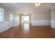 Bright and open living area with chair railing and smooth flooring at 1828 Foxhunt Dr # A, Sun City Center, FL 33573