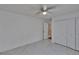 Bedroom features a closet and bright, natural light with tile floors at 1905 Horseshoe Dr, Plant City, FL 33566