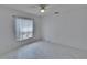 Bedroom with large windows and tile floors at 1905 Horseshoe Dr, Plant City, FL 33566