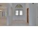 Spacious entryway with tile floors, neutral walls, recessed lighting, and double front doors with glass detailing at 1905 Horseshoe Dr, Plant City, FL 33566
