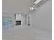 Open-concept living area with fireplace, tile flooring, and natural light at 1905 Horseshoe Dr, Plant City, FL 33566