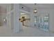 Bright living room with fireplace, tile floors, and sliding glass doors at 1905 Horseshoe Dr, Plant City, FL 33566