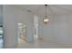 Open floor plan with easy access to the kitchen and a view to the backyard at 1905 Horseshoe Dr, Plant City, FL 33566