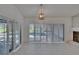 Spacious living area with marble floors and a view to the backyard at 1905 Horseshoe Dr, Plant City, FL 33566