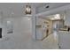 Open floor plan with easy access to the kitchen and living room area at 1905 Horseshoe Dr, Plant City, FL 33566
