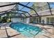 This screened pool boasts a pool and spa, providing a private outdoor retreat at 1905 Horseshoe Dr, Plant City, FL 33566