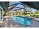 This stunning, screened-in pool with a spa is the perfect place to unwind at 1905 Horseshoe Dr, Plant City, FL 33566