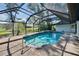 Inviting pool with spa and screened-in enclosure for year-round enjoyment at 1905 Horseshoe Dr, Plant City, FL 33566