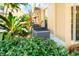 Well-maintained exterior with lush landscaping, showcasing the home's curb appeal at 191 Banyan Bay Dr, St Petersburg, FL 33705