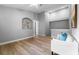 Spacious loft features an decorative niche, hardwood floors and a comfortable seating area at 191 Banyan Bay Dr, St Petersburg, FL 33705