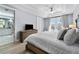 Elegant main bedroom featuring hardwood floors, balcony access, and a stylish adjoining bathroom at 191 Banyan Bay Dr, St Petersburg, FL 33705
