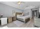 Spacious main bedroom with a tray ceiling, hardwood floors, and a luxurious, relaxing atmosphere at 191 Banyan Bay Dr, St Petersburg, FL 33705