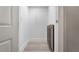 Bright pantry with a built-in wine cooler and storage rack provides space and modern convenience at 191 Banyan Bay Dr, St Petersburg, FL 33705