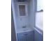 Bathroom featuring a sink with vanity, a mirror, a window and neutral paint at 1924 30Th S St, St Petersburg, FL 33712
