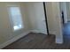 Bedroom featuring a large window, wood floors, and neutral paint at 1924 30Th S St, St Petersburg, FL 33712