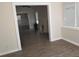 Living room with a fireplace, wood floors, a ceiling fan and plenty of natural light from the windows at 1924 30Th S St, St Petersburg, FL 33712