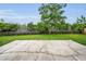 Features a large concrete patio ideal for outdoor seating and entertainment at 204 Lake Charles Ct, Oldsmar, FL 34677