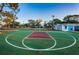 Well-maintained community basketball court, with lighting and view of the tennis court at 204 Lake Charles Ct, Oldsmar, FL 34677