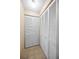 Hallway with multiple storage closets at 204 Lake Charles Ct, Oldsmar, FL 34677