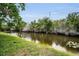 A serene waterfront view offers a peaceful and picturesque setting at 204 Lake Charles Ct, Oldsmar, FL 34677