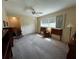 Bright bedroom with a ceiling fan, closet, and space for a comfortable setup at 2195 Academy Dr, Clearwater, FL 33764