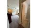 Bedroom featuring a ceiling fan, closet space, and access to an attached bathroom at 2195 Academy Dr, Clearwater, FL 33764