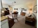 Comfortable living room featuring neutral carpet, furnishings and decor at 2195 Academy Dr, Clearwater, FL 33764
