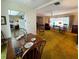 Open floor plan showcasing the dining area and living room with seamless flow at 2195 Academy Dr, Clearwater, FL 33764