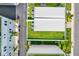Aerial view of rooftop terraces with artificial grass and outdoor seating at 2442 W Mississippi Ave # 5, Tampa, FL 33629