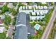 An aerial view highlights the townhomes with rooftop terraces and a community pool at 2442 W Mississippi Ave # 5, Tampa, FL 33629