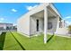 Exterior rooftop deck features artificial turf and covered entry at 2442 W Mississippi Ave # 5, Tampa, FL 33629