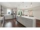 Bright kitchen features an island, stainless steel appliances, and views to the dining area at 2442 W Mississippi Ave # 5, Tampa, FL 33629
