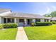 Charming single-story home with well-manicured lawn and inviting entrance at 2510 Laurelwood Dr # 5B, Clearwater, FL 33763