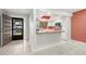 Open-concept kitchen with breakfast bar, stainless appliances, and bright, airy feel at 2510 Laurelwood Dr # 5B, Clearwater, FL 33763