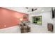 Cozy living room with access to screened porch and lots of natural light at 2510 Laurelwood Dr # 5B, Clearwater, FL 33763